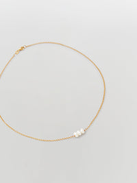 the line of sun triple pearl necklace