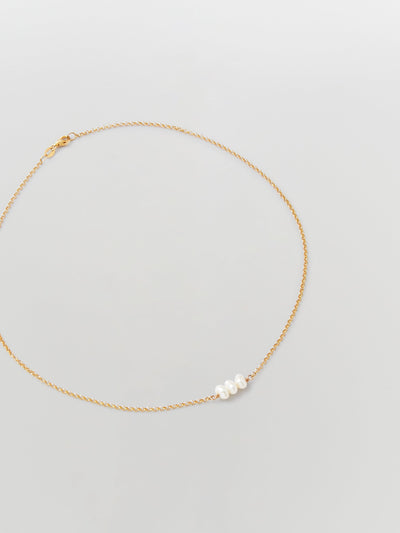 the line of sun triple pearl necklace